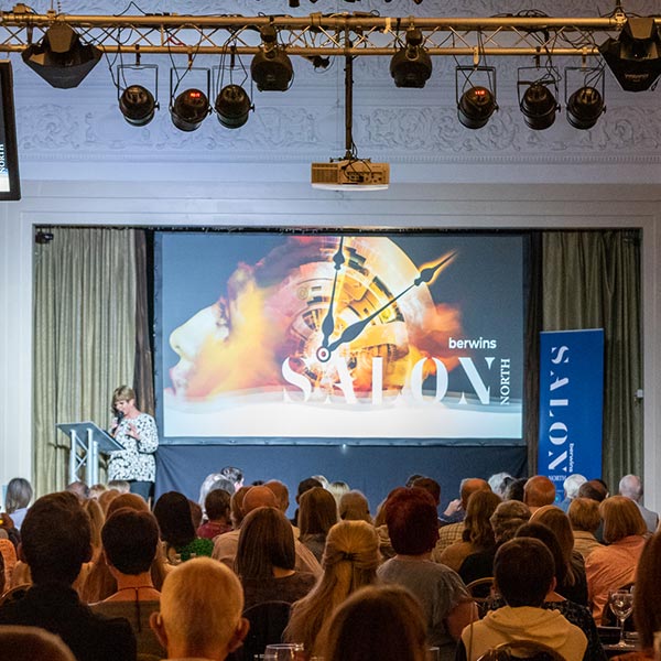 A speaker on stage at Berwins Salon North.