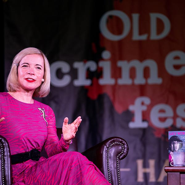 Lucy Worsley sat on the stage of the Old Peculier Crime Writing Festival.